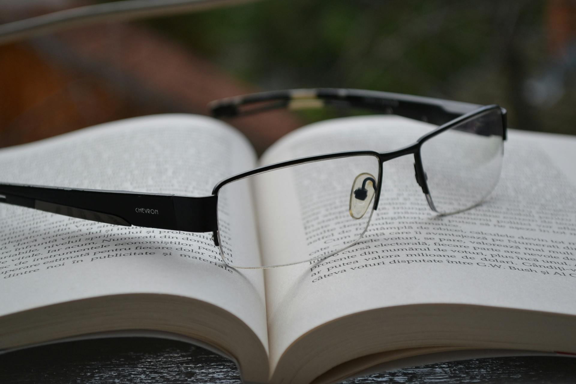 Glasses resting on book